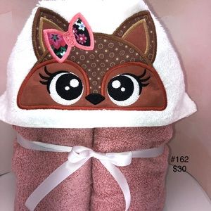 Hooded towel with fox embroidered design